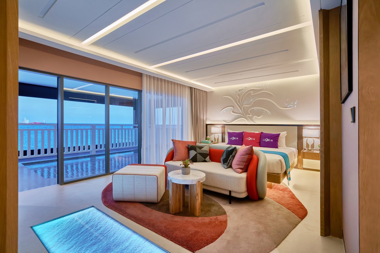 Property showroom bedroom opening onto a private pool deck